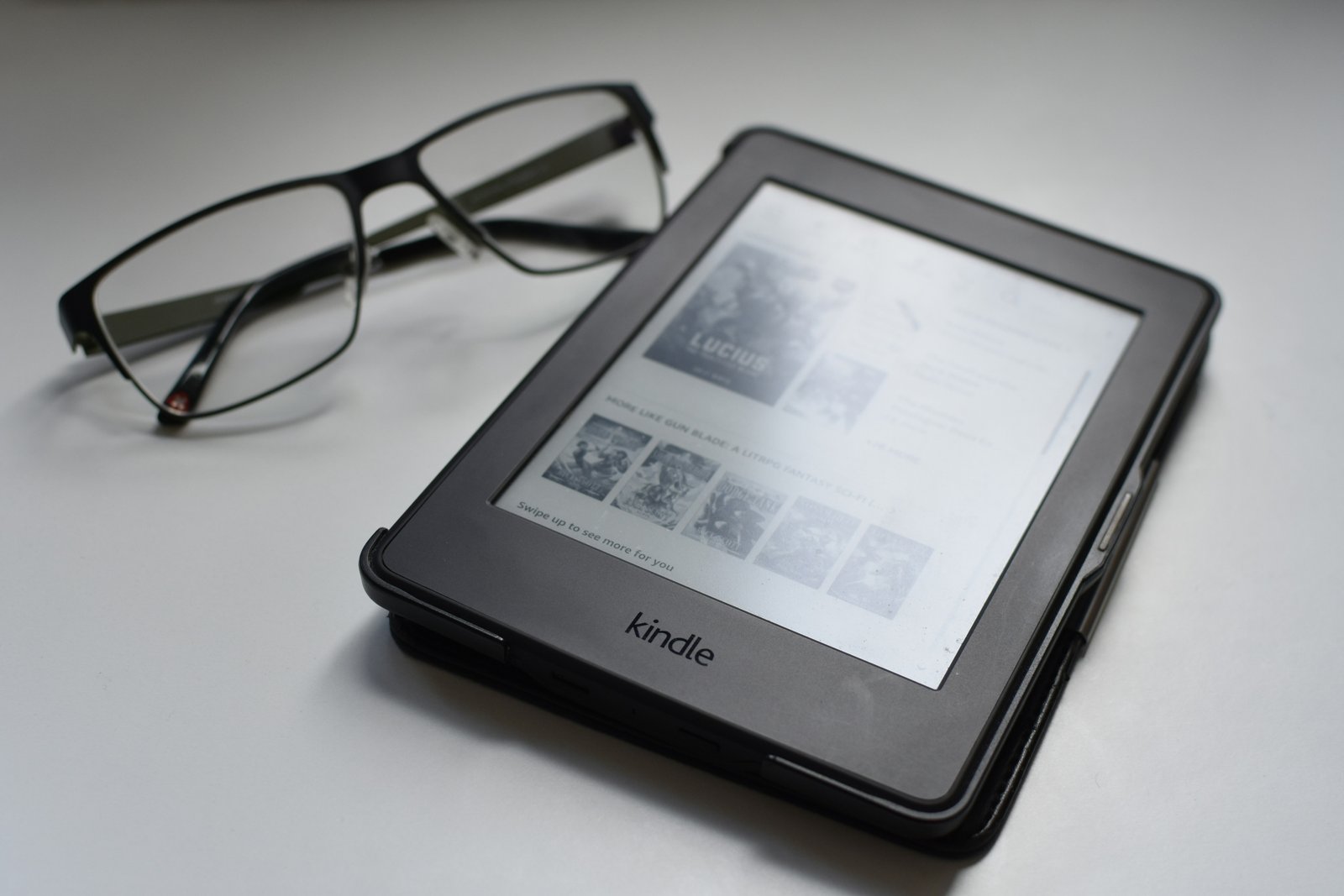 Person reading on a Kindle device